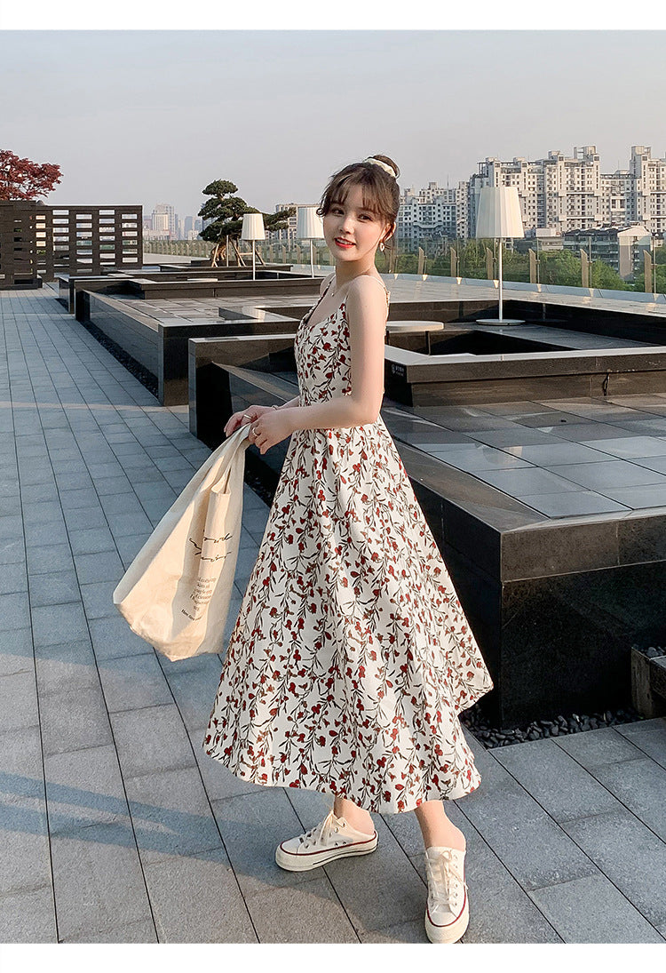 Floral strap dress women's waist slimming summer small fresh 2024 new long skirt foreign trade women's wholesale by DERILUJA LLC
