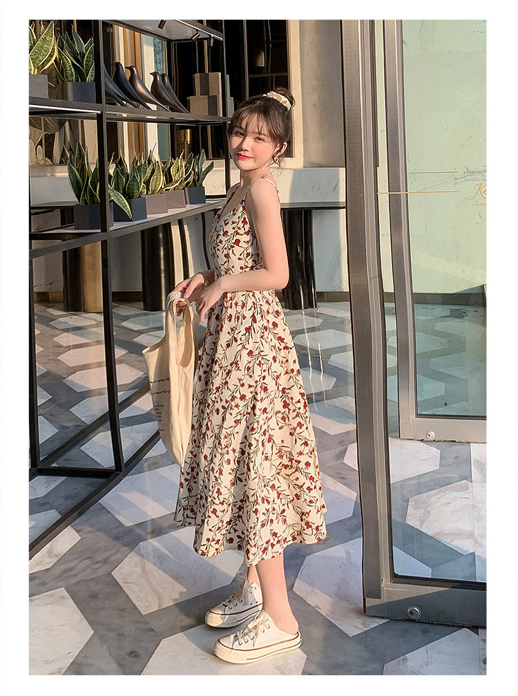 Floral strap dress women's waist slimming summer small fresh 2024 new long skirt foreign trade women's wholesale by DERILUJA LLC