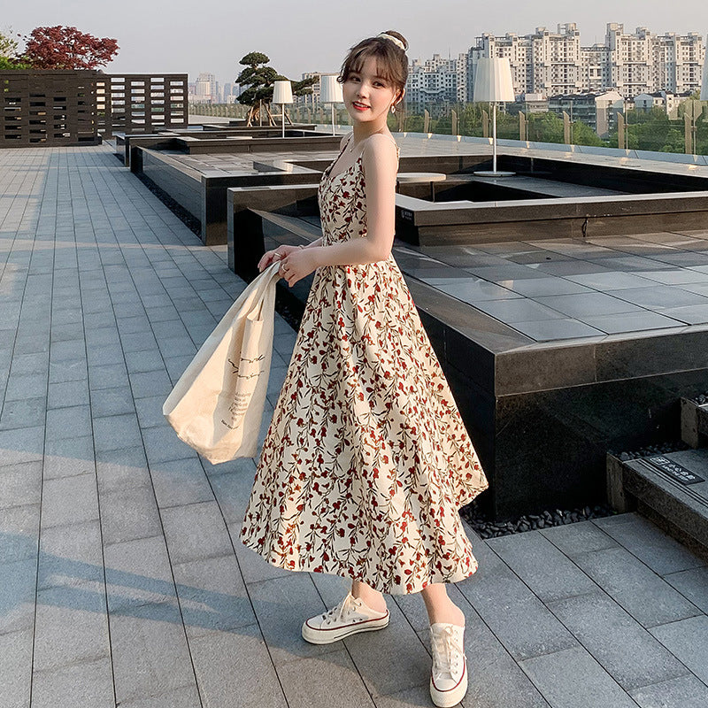 Floral strap dress women's waist slimming summer small fresh 2024 new long skirt foreign trade women's wholesale by DERILUJA LLC