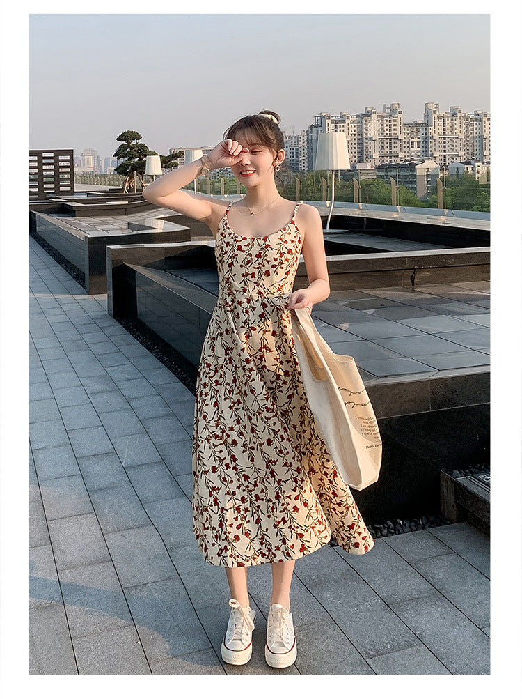 Floral strap dress women's waist slimming summer small fresh 2024 new long skirt foreign trade women's wholesale by DERILUJA LLC
