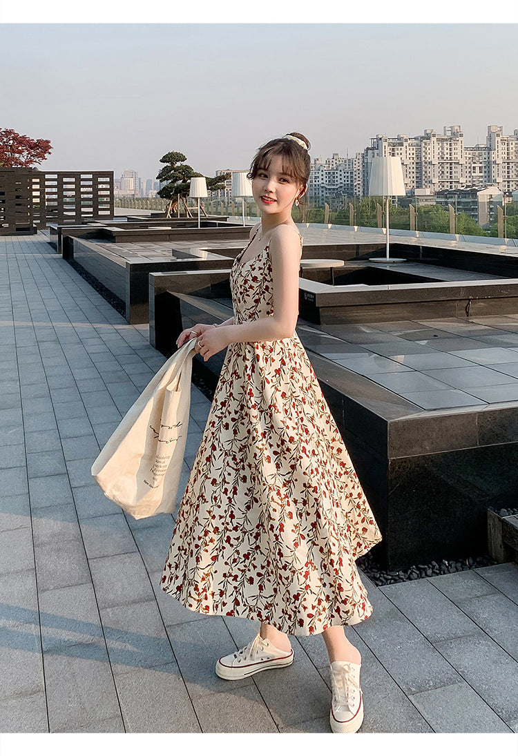 Floral strap dress women's waist slimming summer small fresh 2024 new long skirt foreign trade women's wholesale by DERILUJA LLC