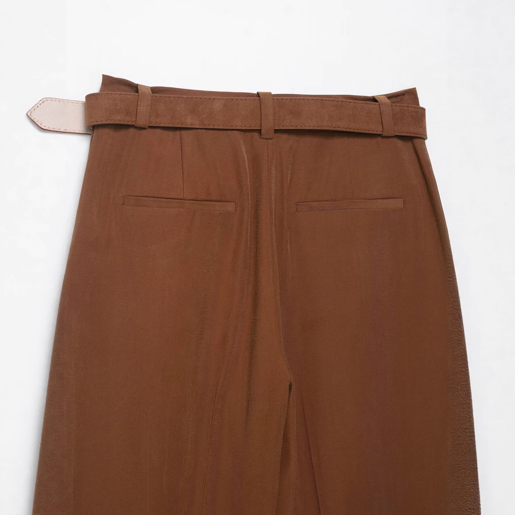 Narrow leg pants with waist belt and hanging pleats by eprolo