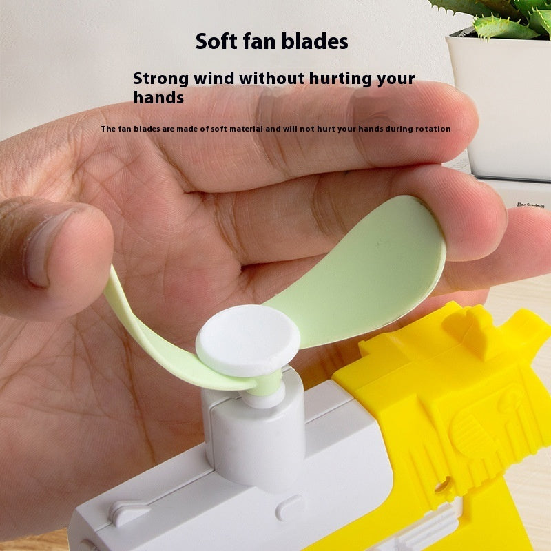 Radish Gun Little Fan Mini-Portable by DERILUJA LLC