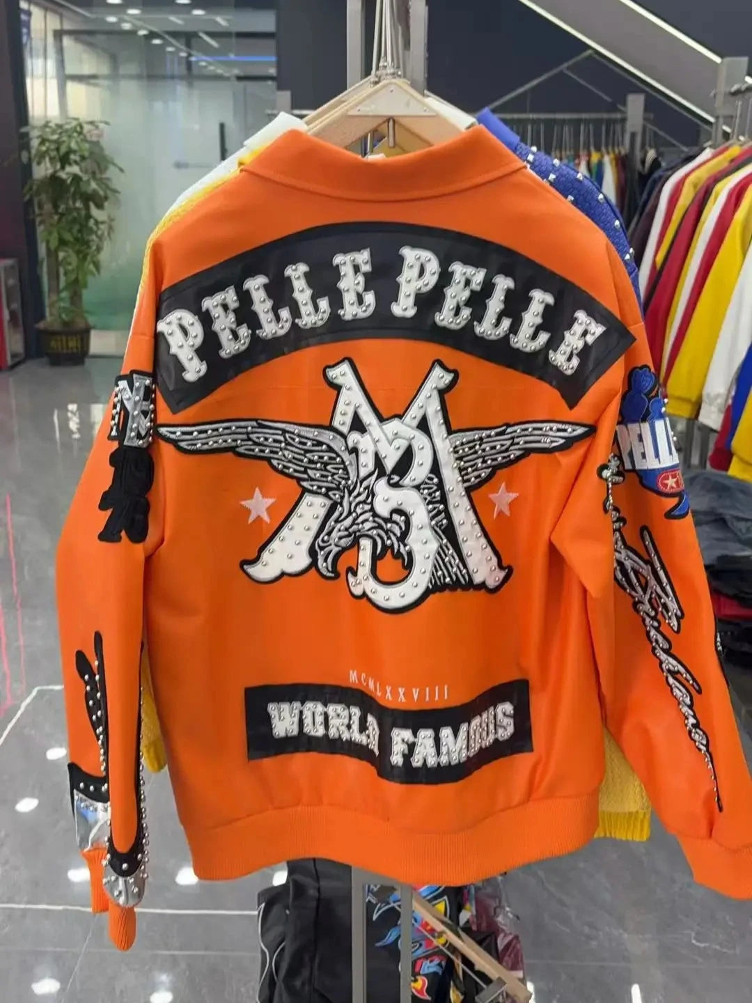 Hip-hop eagle embroidery leather jackets cool flame decoration baseball streetwear autumn and winter jacket men clothing by DERILUJA LLC