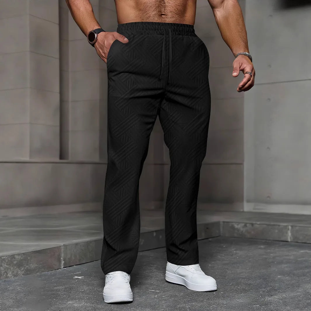 Men's sporty casual trousers, fashionable jacquard elastic waist street pants, solid-color loose all-season pants by DERILUJA LLC
