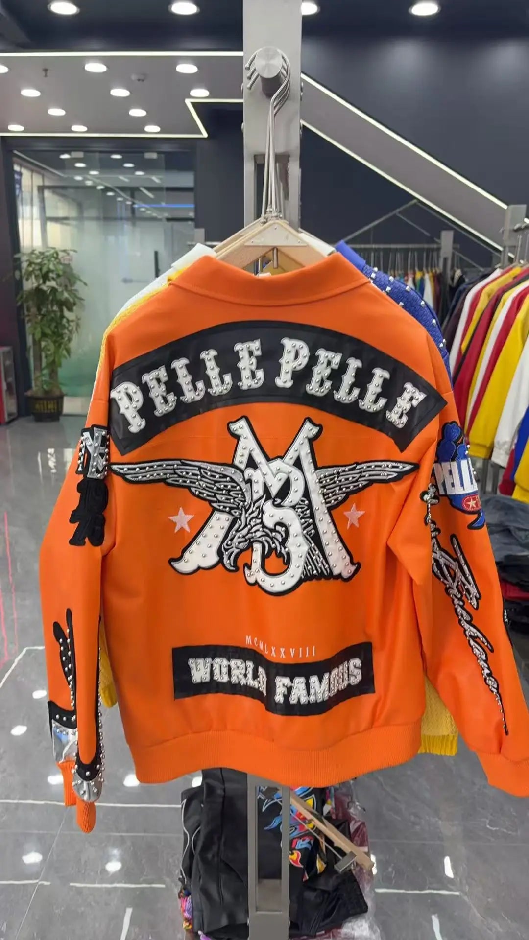 Hip-hop eagle embroidery leather jackets cool flame decoration baseball streetwear autumn and winter jacket men clothing by DERILUJA LLC