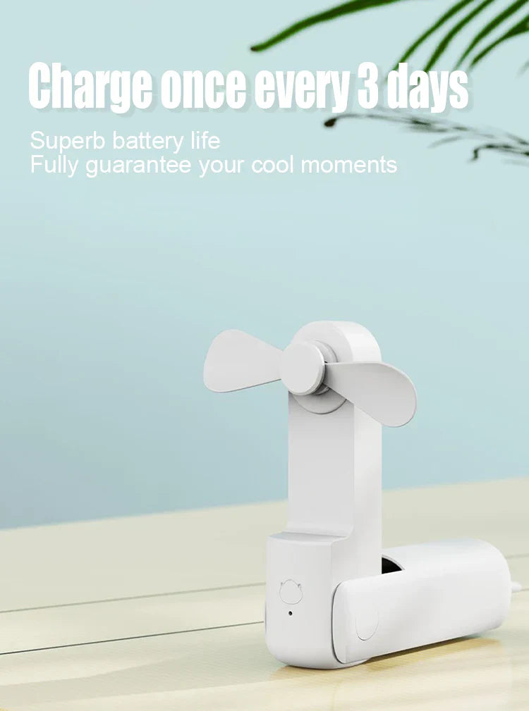 Foldable Rechargeable Mini Fan by DERILUJA LLC